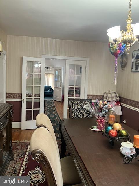 1214 Haworth St, Philadelphia, PA 19124 - dining space with a chandelier and wood finished floors