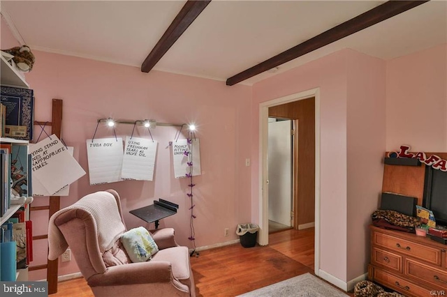 517 W Burke St, Easton, PA 18042 - living area with beamed ceiling, wood finished floors, and baseboards