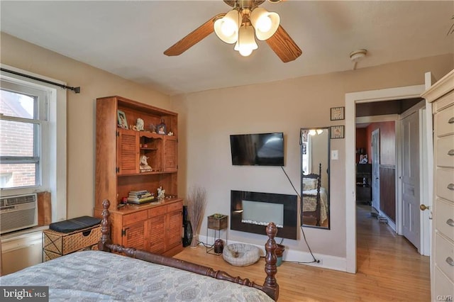 517 W Burke St, Easton, PA 18042 - bedroom with light wood finished floors, baseboards, and a ceiling fan