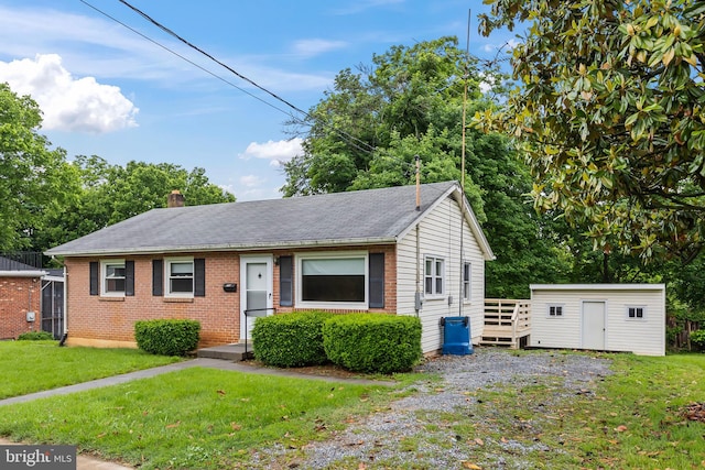 311 S Buckmarsh St, Berryville, VA 22611 - view of front of house featuring a front lawn, brick siding, a chimney, and a wooden deck