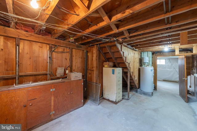 311 S Buckmarsh St, Berryville, VA 22611 - basement featuring water heater and stairs