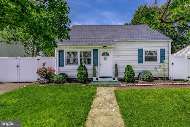 113 Tremont St, Manassas Park, VA 20111 - view of front facade featuring a gate and a shingled roof