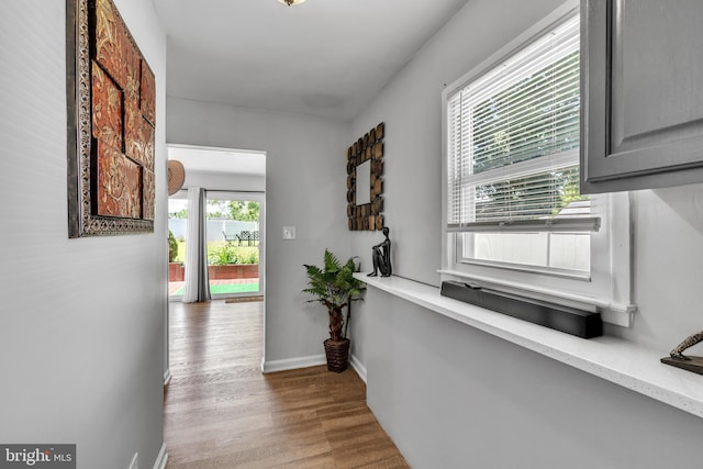 113 Tremont St, Manassas Park, VA 20111 - corridor featuring wood finished floors and baseboards
