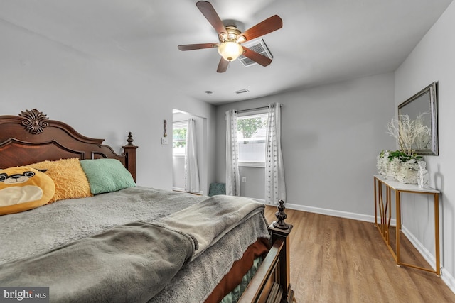 113 Tremont St, Manassas Park, VA 20111 - bedroom featuring wood finished floors, baseboards, and a ceiling fan