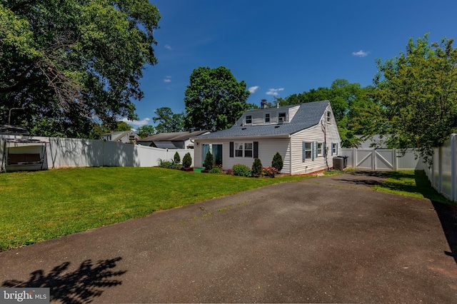 113 Tremont St, Manassas Park, VA 20111 - rear view of property featuring a gate and roof with shingles