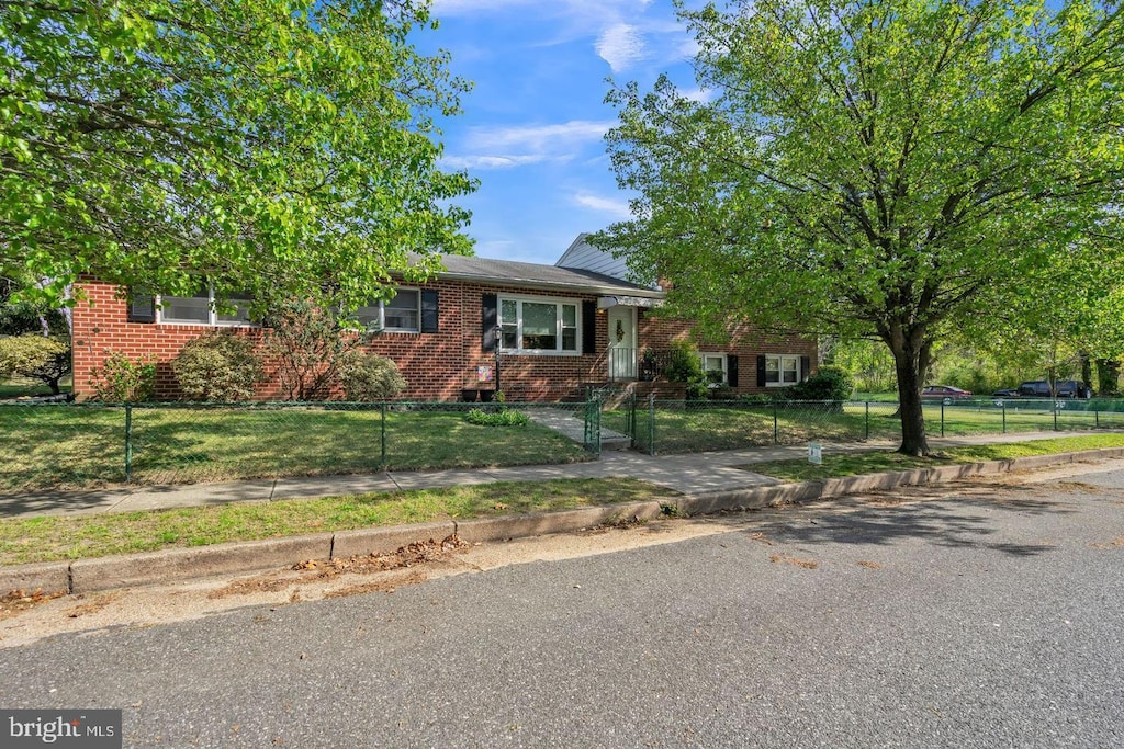 345 Woodbine Ave, Westville, NJ 08093 - view of front of house featuring brick siding