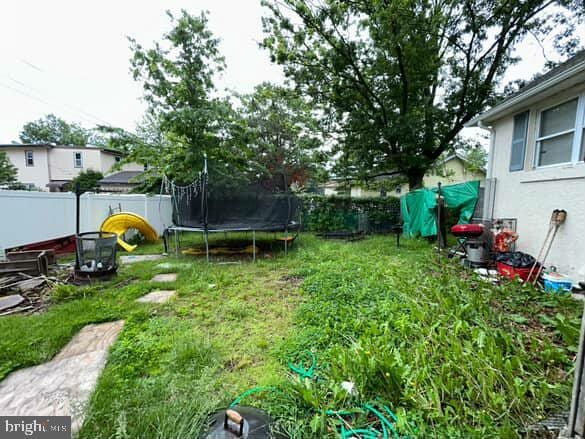 332 Fernwood Ave, Folsom, PA 19033 - view of yard featuring a trampoline