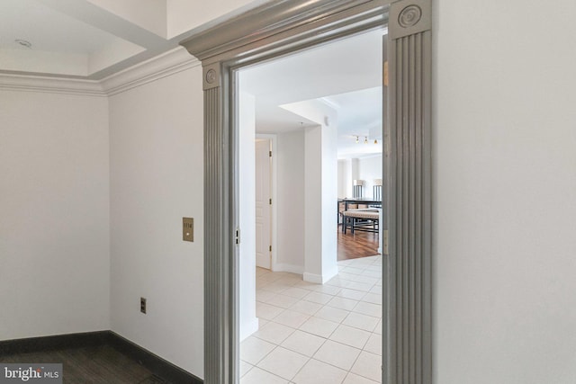 616 E St NW Unit 1114, Washington, DC 20004 - corridor with light tile patterned flooring, baseboards, and ornamental molding