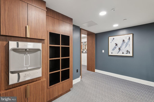 616 E St NW Unit 1114, Washington, DC 20004 - kitchen featuring light colored carpet, baseboards, and recessed lighting