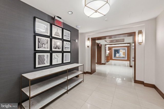 616 E St NW Unit 1114, Washington, DC 20004 - hall featuring baseboards and light tile patterned floors