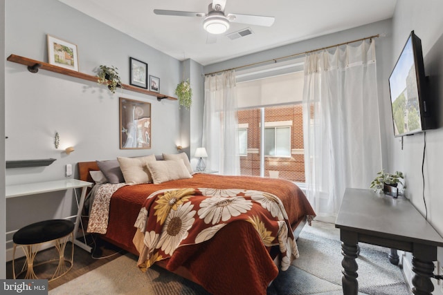 625 Slaters Ln Unit 201, Alexandria, VA 22314 - bedroom with multiple windows and a ceiling fan