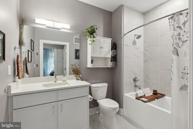 625 Slaters Ln Unit 201, Alexandria, VA 22314 - bathroom with marble look tile flooring, vanity, toilet, shower / bath combo, and baseboards