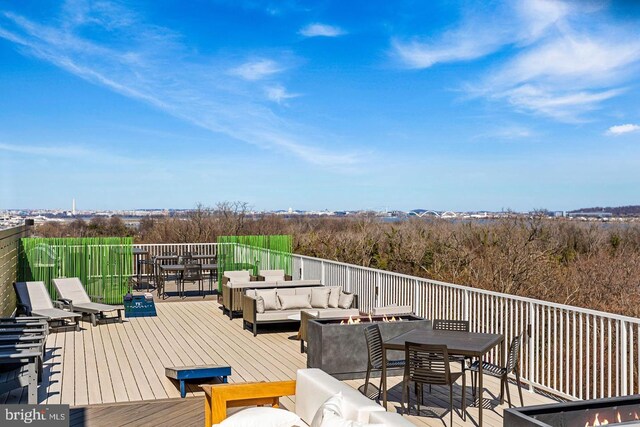 625 Slaters Ln Unit 201, Alexandria, VA 22314 - wooden terrace with an outdoor living space and outdoor dining area