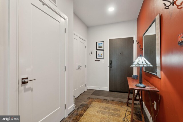 625 Slaters Ln Unit 201, Alexandria, VA 22314 - entrance foyer with baseboards and wood finished floors