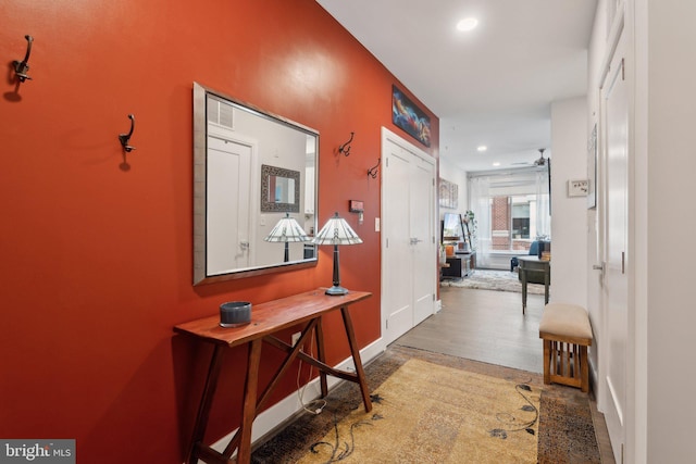 625 Slaters Ln Unit 201, Alexandria, VA 22314 - hall with recessed lighting, wood finished floors, and baseboards
