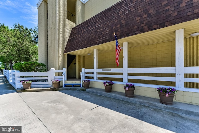 11 62nd St Unit 212, Ocean City, MD 21842 - view of property exterior with roof with shingles