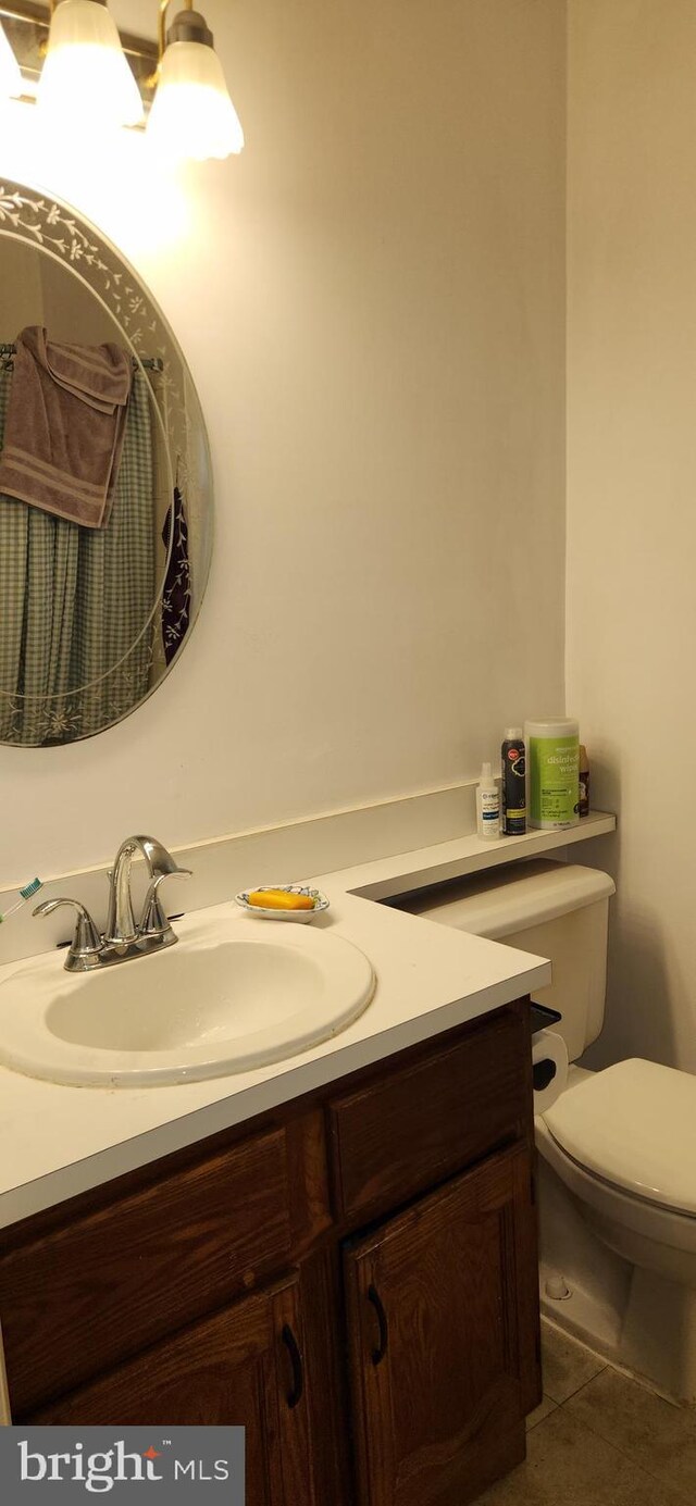 20 Norwick Dr, Forked River, NJ 08731 - bathroom featuring vanity, toilet, and tile patterned flooring