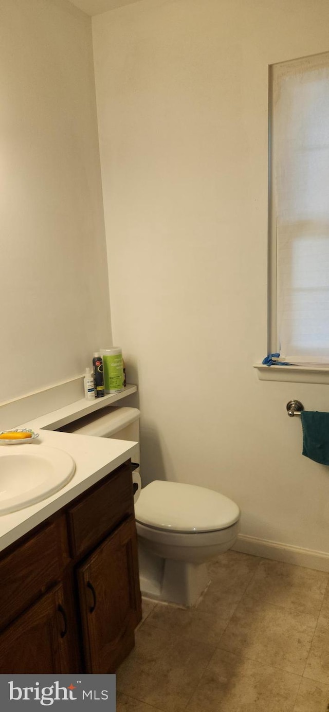 20 Norwick Dr, Forked River, NJ 08731 - half bathroom featuring vanity, tile patterned flooring, and toilet