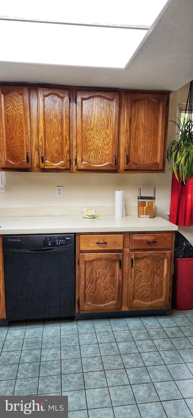 20 Norwick Dr, Forked River, NJ 08731 - kitchen with black dishwasher, light countertops, and brown cabinetry