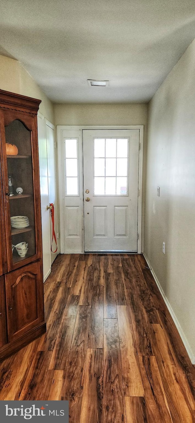 20 Norwick Dr, Forked River, NJ 08731 - doorway to outside with dark wood-type flooring and healthy amount of natural light