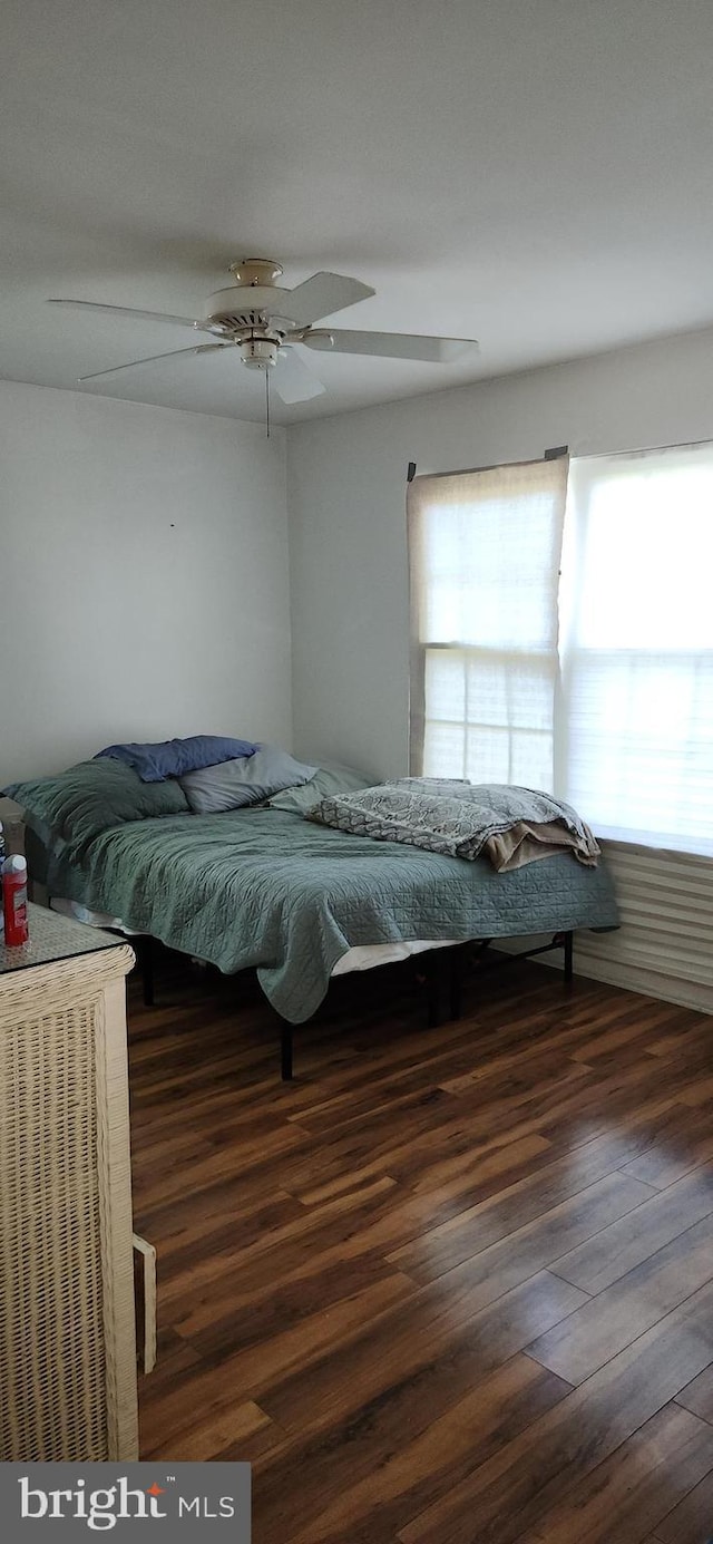 20 Norwick Dr, Forked River, NJ 08731 - bedroom with multiple windows, wood finished floors, and ceiling fan