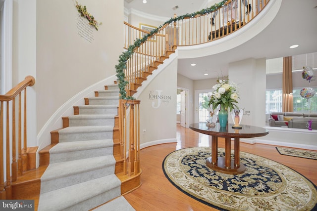 14201 Village Manor Ct, Upper Marlboro, MD 20774 - entrance foyer with stairway, wood finished floors, a high ceiling, baseboards, and recessed lighting