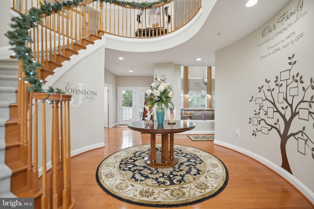 14201 Village Manor Ct, Upper Marlboro, MD 20774 - foyer entrance with stairs, wood finished floors, baseboards, and recessed lighting