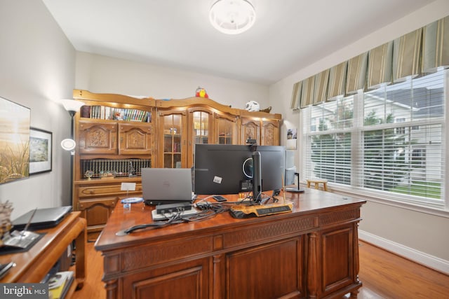 14201 Village Manor Ct, Upper Marlboro, MD 20774 - home office featuring plenty of natural light, light wood-type flooring, and baseboards