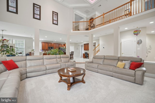 14201 Village Manor Ct, Upper Marlboro, MD 20774 - living area featuring a high ceiling, stairway, recessed lighting, baseboards, and carpet floors