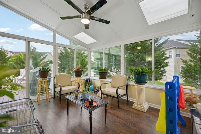 14201 Village Manor Ct, Upper Marlboro, MD 20774 - sunroom with a skylight, wood-type flooring, and baseboards