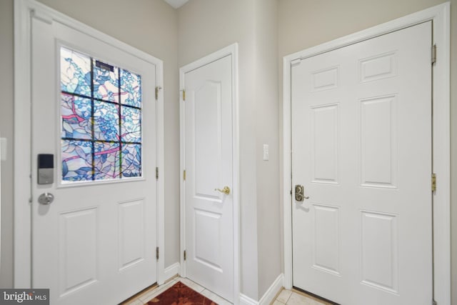 14201 Village Manor Ct, Upper Marlboro, MD 20774 - doorway featuring baseboards and light tile patterned floors