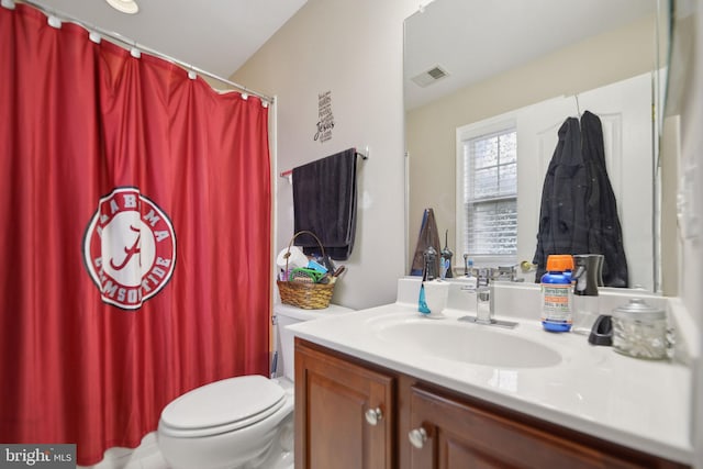 14201 Village Manor Ct, Upper Marlboro, MD 20774 - bathroom with vanity, toilet, and a shower with shower curtain