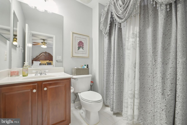 14201 Village Manor Ct, Upper Marlboro, MD 20774 - full bathroom featuring tile patterned flooring, vanity, toilet, a ceiling fan, and a shower with curtain