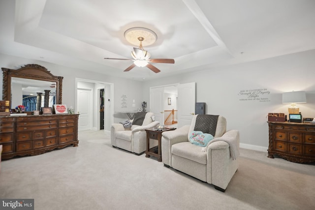 14201 Village Manor Ct, Upper Marlboro, MD 20774 - carpeted bedroom featuring a tray ceiling, ceiling fan, and baseboards