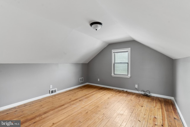 218 Center Ave, Mount Ephraim, NJ 08059 - additional living space with hardwood / wood-style floors, baseboards, and vaulted ceiling