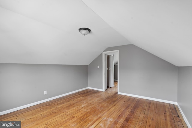 218 Center Ave, Mount Ephraim, NJ 08059 - bonus room featuring hardwood / wood-style flooring, lofted ceiling, and baseboards