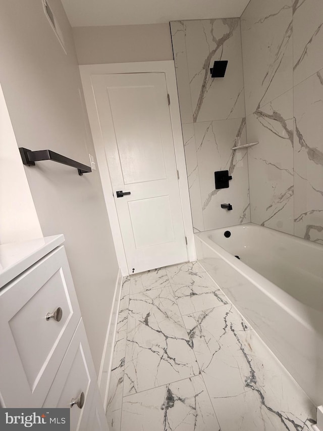 114 Marshall Rd, Lansdowne, PA 19050 - full bathroom featuring marble finish floors, vanity, baseboards, and shower / bathtub combination
