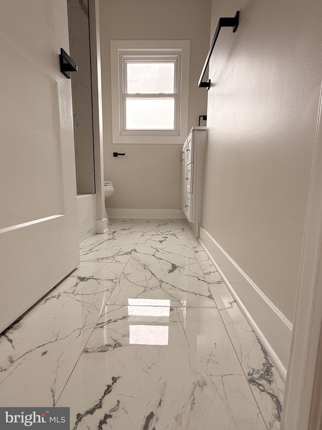 114 Marshall Rd, Lansdowne, PA 19050 - full bathroom with baseboards, marble finish floors, and toilet