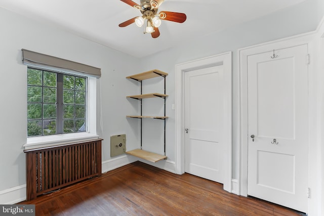 1201 Grenox Rd, Wynnewood, PA 19096 - unfurnished bedroom with radiator heating unit, wood finished floors, baseboards, and a ceiling fan