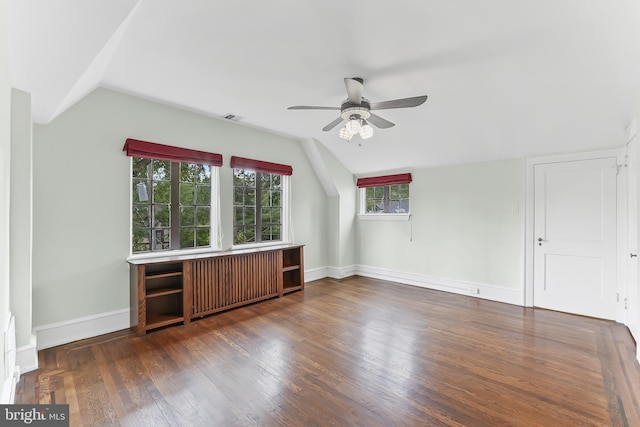 1201 Grenox Rd, Wynnewood, PA 19096 - unfurnished living room featuring vaulted ceiling, a ceiling fan, radiator heating unit, wood finished floors, and baseboards