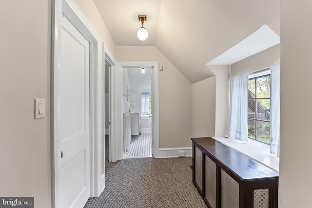 1201 Grenox Rd, Wynnewood, PA 19096 - hallway featuring vaulted ceiling, baseboards, and carpet flooring