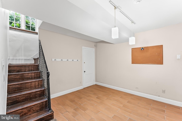 1201 Grenox Rd, Wynnewood, PA 19096 - stairs with baseboards and wood finished floors