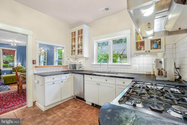 15 Jefferson Ave, Takoma Park, MD 20912 - kitchen with a sink, backsplash, white cabinets, stovetop, and glass insert cabinets