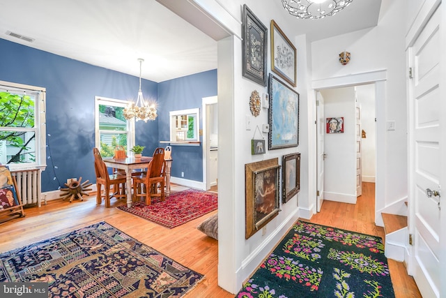 15 Jefferson Ave, Takoma Park, MD 20912 - foyer entrance featuring a chandelier, wood finished floors, and baseboards