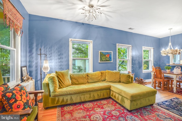 15 Jefferson Ave, Takoma Park, MD 20912 - living area with a chandelier, wood finished floors, and plenty of natural light