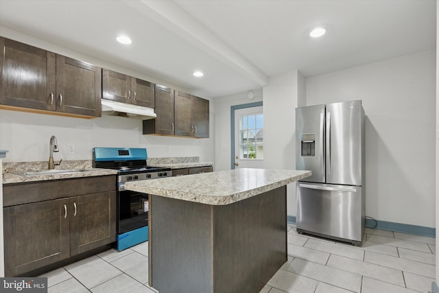 603 Vernon St, Media, PA 19063 - kitchen featuring stainless steel appliances, a sink, under cabinet range hood, light countertops, and dark brown cabinets
