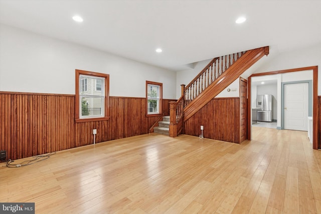603 Vernon St, Media, PA 19063 - unfurnished living room with a wainscoted wall, wood-type flooring, stairs, and recessed lighting