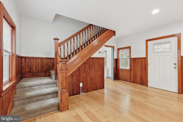 603 Vernon St, Media, PA 19063 - foyer entrance with a wainscoted wall, wood finished floors, stairway, wood walls, and recessed lighting