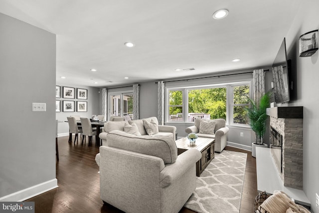 2302 Solmar Dr, Silver Spring, MD 20904 - living room with baseboards, wood finished floors, recessed lighting, and a fireplace