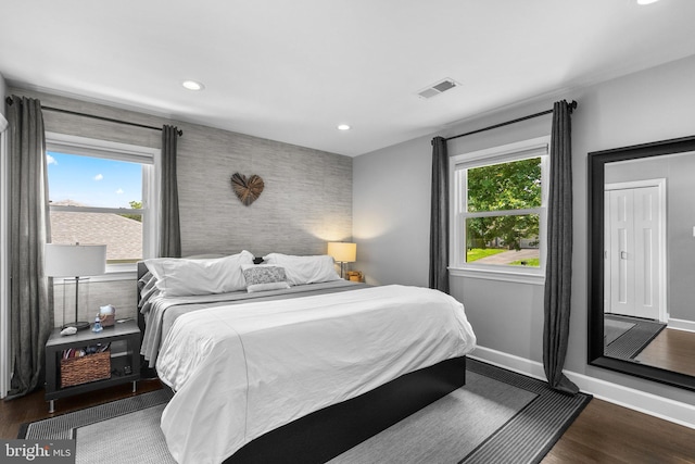 2302 Solmar Dr, Silver Spring, MD 20904 - bedroom featuring baseboards, wood finished floors, recessed lighting, and an accent wall